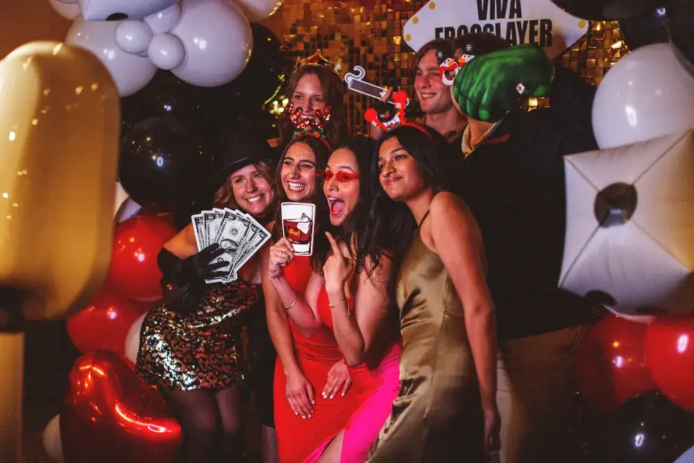 Interns at the end-of-year party photo booth